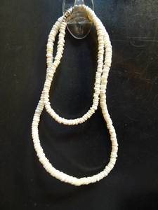 lot 166 image: LOVELY SET OF AUTHENTIC PUKA BEADS - CHOKER NECKLACE AND BRACELET