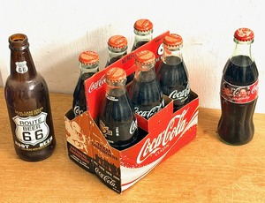 lot 20 image: Collectible Six Pack of Texas Longhorn NationalChampionship Commemorative Glass Bottles of Coca-Cola Bottles, Dale EarnhardtDale Earnhardt Jr. Coca-Cola Bottle, &amp Route 66 Rootbeer Glass Bottle