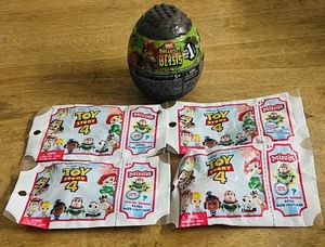 lot 72 image: Four (4) Packs of Toy Story 4 Minis W Potential Special Edition Astro Buzz Lightyear &amp Mega Breakout Beasts Series 1 Slime Egg WBuildable Mystery Figure&nbsp