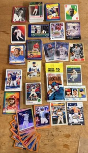 lot 212 image: Large Lot of Assorted Baseball Cards- Including Rookies, Parallels, Inserts, Limited Edition Numbered Cards, &amp Unopened Pack of 2021 Topps Heritage Baseball Cards