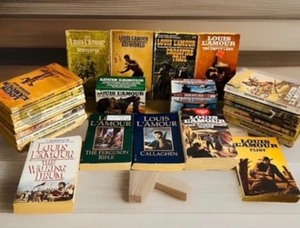 lot 186 image: Huge Lot of Vintage Louis LAmour Paperbacks - From the 50s up