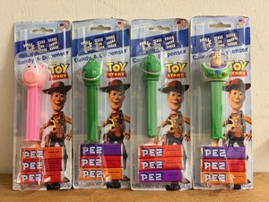 lot 248 image: Four (4) Toy Story Themed PEZ Dispensers - Including Buzz Lightyear &amp Rex