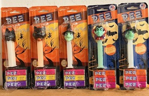 lot 245 image: Five (5) Halloween Themed PEZ Glow in the Dark Dispensers&nbsp