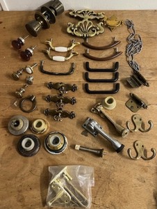 lot 123 image: Vintage Lot of Drawer and Cabinet Pulls, Door Stops, Hinges, &amp Other Assorted Hardware