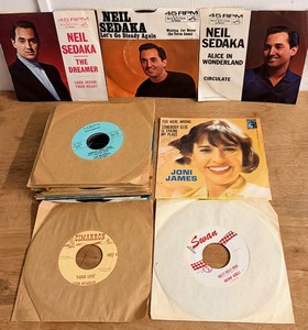 lot 149 image: Twenty-Five 45 RPM Records from the 50s-60s - Including Joni James &amp Neil Sedaka