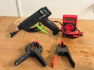 lot 30 image: Surebonder High Temp Glue Gun, 7 Function Digital Multimeter, &amp Two (2) Large Clamps