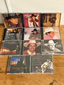 lot 148 image: Eight (8) George Strait CDs