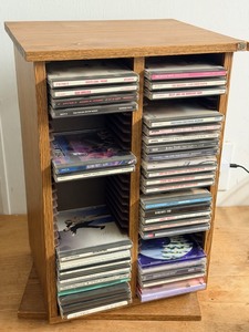 lot 146 image: CD Carousel with Great Selection of Rock, Pop, Easy Listening,&amp Country CDs