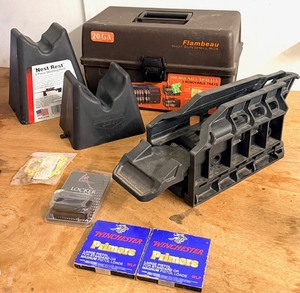 lot 34 image: Gun Shooting Supplies - Including Two (2) 100 Count Boxes of Winchester Large Pistol Primers, Kowloon ATV Gun Mount, Nest Rest Two Puece Shooting Rest, &amp Flambeau Shotgun Shell Box