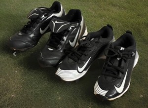 lot 183 image: Two Pairs of Nike Baseball Shoes - Sizes 12C &amp 1.5Y
