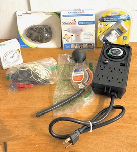 lot 240 image: useful Household Items - Including Wax Vac Ear Cleaner, Intermatic Heavy Duty Outside Timer Control, Rapid Test Anti-Freeze and Coolant Tester, &amp Key Hider Fake Rock