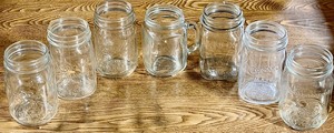 lot 285 image: Seven (7) Mason Jars - Including Ball, Golden Harvest, Crown, Knox, &amp Magic