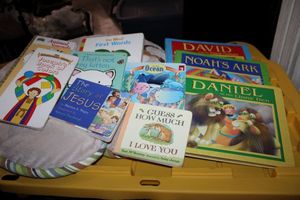 lot 69 image: Baby mobile and childrens books