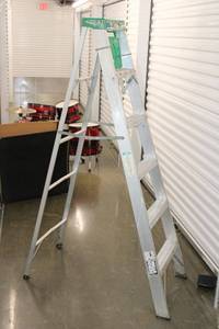 lot 15 image: 6 ft. folding aluminum ladder with paint tray
