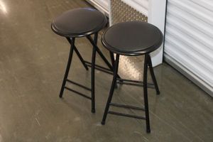 lot 14 image: Two Folding black stool chairs