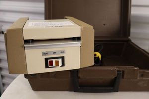 lot 106 image: Small laminator with case model 5000