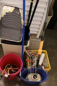 lot 109 image: Painting supplies, mop bucket, bungee cords and trash cans
