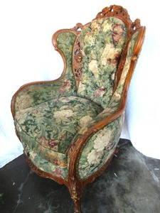 lot 500 image: Ornate Victorian style wing back button tufted chair with hand carved wood trim throughout