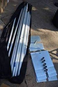 lot 133 image: Pipe and drape aluminum poles, heavy base stands and blue drapes
