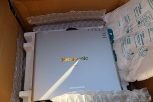 lot 4 image: Panasonic DLP Projector model PT-DZ770US plus cables, see photos