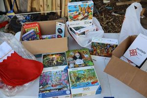 lot 142 image: Puzzles, Christmas decorations and books Multiply by Francis Chan