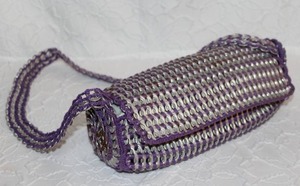 lot 2 image: handbag made from soda can tabs.