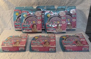 lot 23 image: 8-customizable headband that comes with 8 surprise charms inside. All unopened