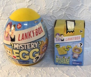 lot 24 image: Lanky Box mystery eeg with 8 gifts in it and Lanky Box mystery plushie both unopened