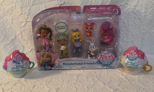 lot 28 image: Disney Junior Alices Wonderland Bakery Wonderland Friends figure set.  And  2- Disney Junior Alices Wonderland Bakery Tea Party Capsule Figures Mystery Pack. Unopened