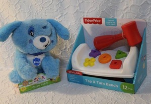 lot 35 image: Spark Create Imagine Interactive Plush Blue Puppy Rolo Sings and Talks New and Fisher-Price Tap & Turn Bench, a double-sided activity toy unopened