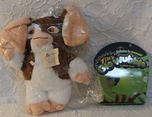lot 42 image: Gremlins Gizmo plush toy. And  Tiny Glo Wubble Bubble Ball.