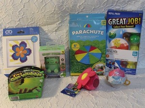lot 45 image: Mixed toy lot Diamond Dotz Quick Dotz Kit, and Froggy Speaker with a phone holder.  And PenGear Eraser Pals Surprise Ball Refill Pack.  And much more see pictures all unopened