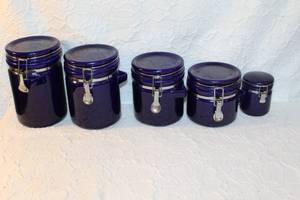 lot 59 image: 5 Piece Kitchen Canister Set in blue ceramic.