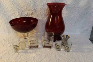 lot 66 image: Jack Daniel whiskey glasses and shot glasses and large red bowl and vase and more see pictures