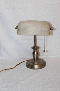 lot 73 image: brushed nickel bankers desk lamp with a frosted white glass shade.