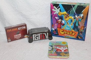 lot 115 image: Lot of unopened games goofy movie game Travel Bingo and more see pictures