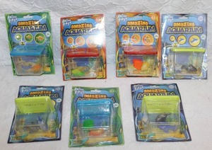 lot 142 image: 7-Amazing Aquarium growing-fish toy kit by Anker Play. All unopened