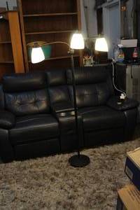 lot 156 image: black three-light floor lamp with a reading light.  Light bulbs not included only put them in to show it works