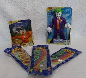 lot 170 image: Fisher-Price Imaginext DC Super Friends The Joker XL 10-Inch Poseable Figure.  Fisher-Price Imaginext Jurassic World Dominion Pyroraptor toy.  And crazy straws all unopened