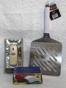 lot 209 image: Handy Can-Opener, Premier Stainless Steel Food Slicer. And over size spatula