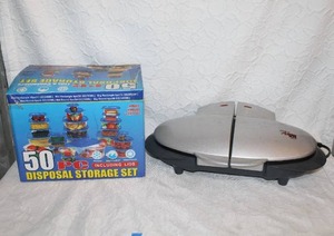 lot 210 image: 50 PC disposal storage set and GT Xpress 101 Deluxe Grill, an indoor countertop grill.