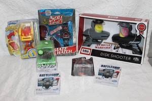 lot 223 image: Mixed toy lot spy gear  card game  disk shooter and much more see pictures