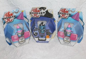 lot 265 image: 2-Bakugan Party Cubbo Cosplay Collectible Figure. And a Bakugan Pirate Cubbo Pack Transforming Collectible Action Figure.  All unopened
