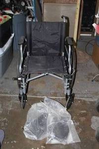 lot 277 image: Fold up wheelchair with feet rest