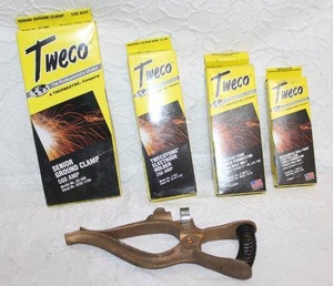 lot 314 image: welding accessories from the brand Tweco, including ground clamps and electrode holders.