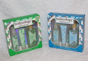 lot 335 image: Bodycology Sparkling Apple 3-piece hand care gift set.  And Bodycology Winter Coconut 3-piece hand care gift set including shimmer mist, hand cream, and nourishing hand soap