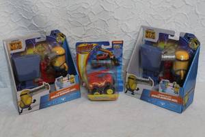 lot 358 image: 2-Despicable Me 4 Mega Minion Mel Launch and Blast Action Figure.  And Fisher-Price Nickelodeon Blaze and the Monster Machines Construction Blaze die-cast vehicle.