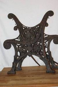 lot 409 image: A set of cast iron garden bench frame with an ornate, possibly Victorian, design.