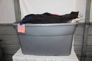 lot 412 image: Large tote full of a mix of womens pants size 16-18 give or take and top sizes L and XL