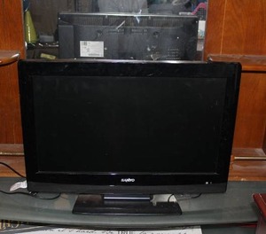 lot 420 image: TV with DVD  player my son used it to play his games on never tested the DVD PLAYER
